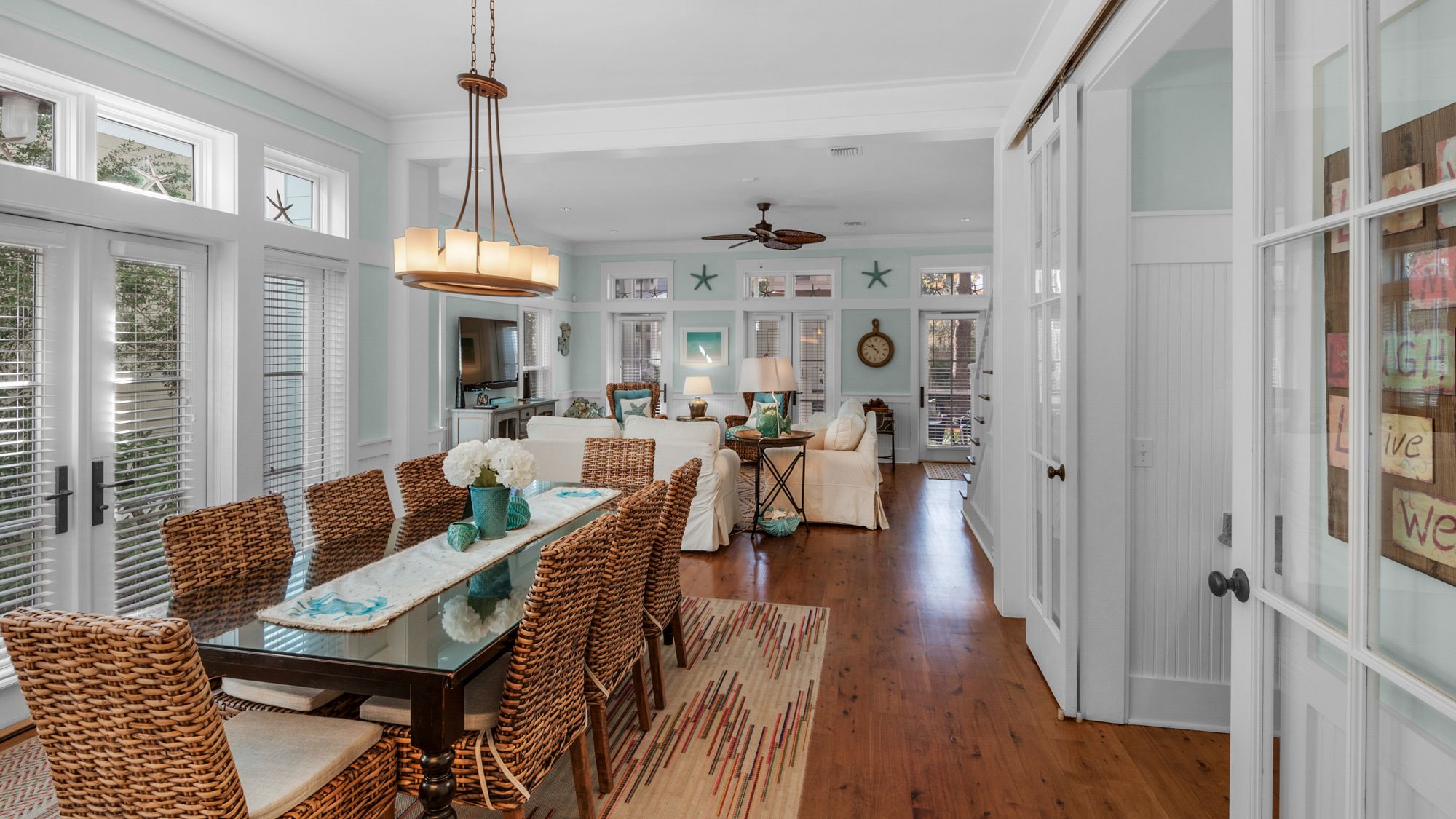 A Whales Tail Dining Table and Living Area