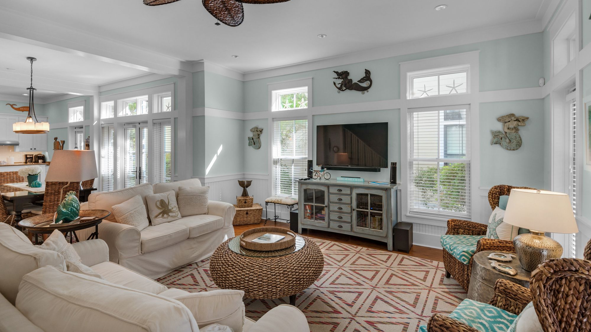 A Whales Tail Living Area with Seating and TV