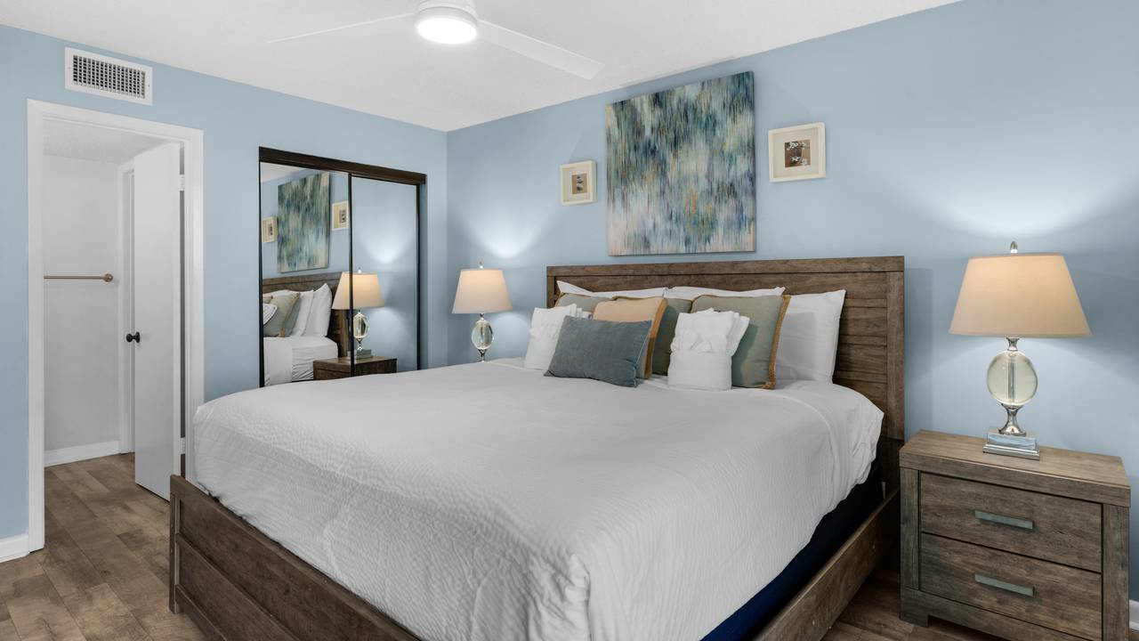 BeachCrest 103 Primary Bedroom w/ Patio access BeachCrest 103 Primary Bedroom w/ Patio access