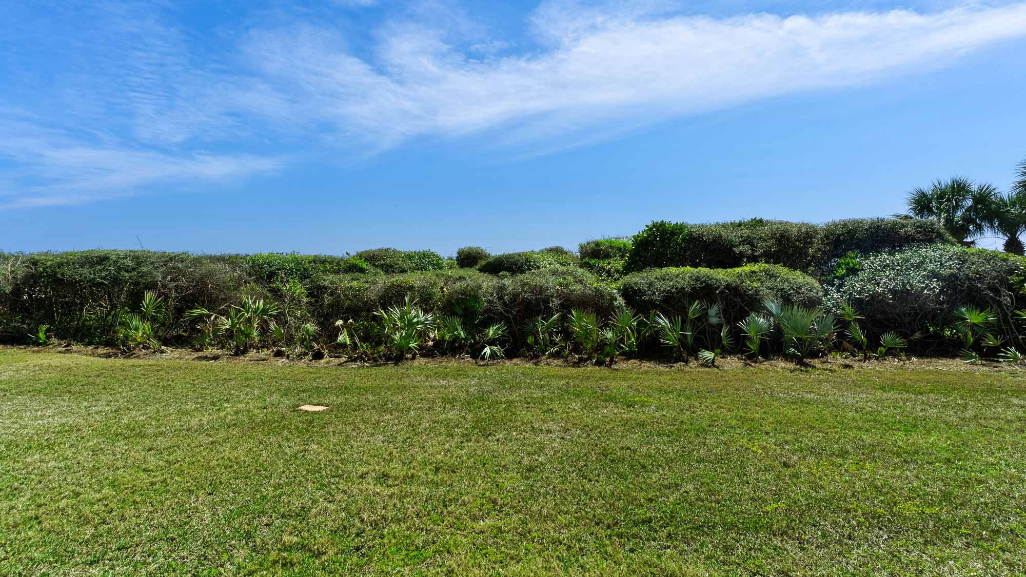 BeachCrest 103 Primary Bedroom w/ Patio Views