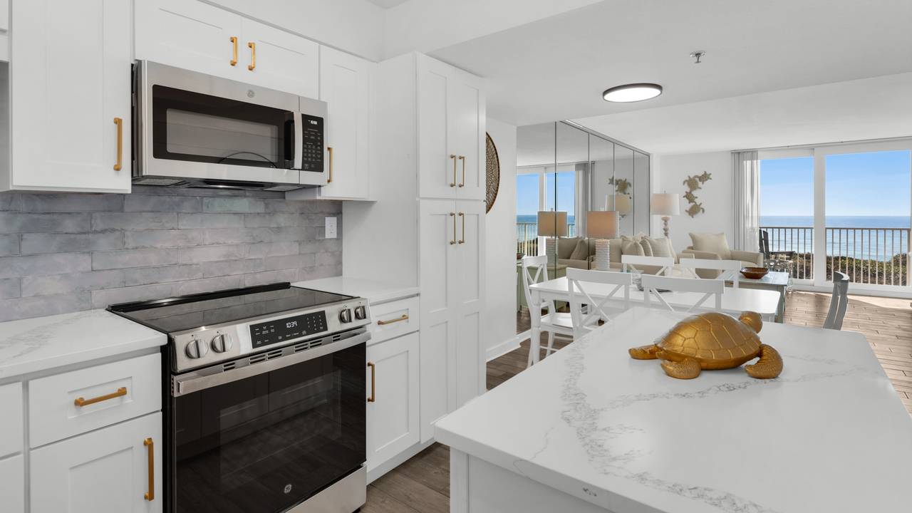 BeachCrest 204: Renovated kitchen and dining/living room with TV BeachCrest 204: Renovated kitchen and dining/living room with TV