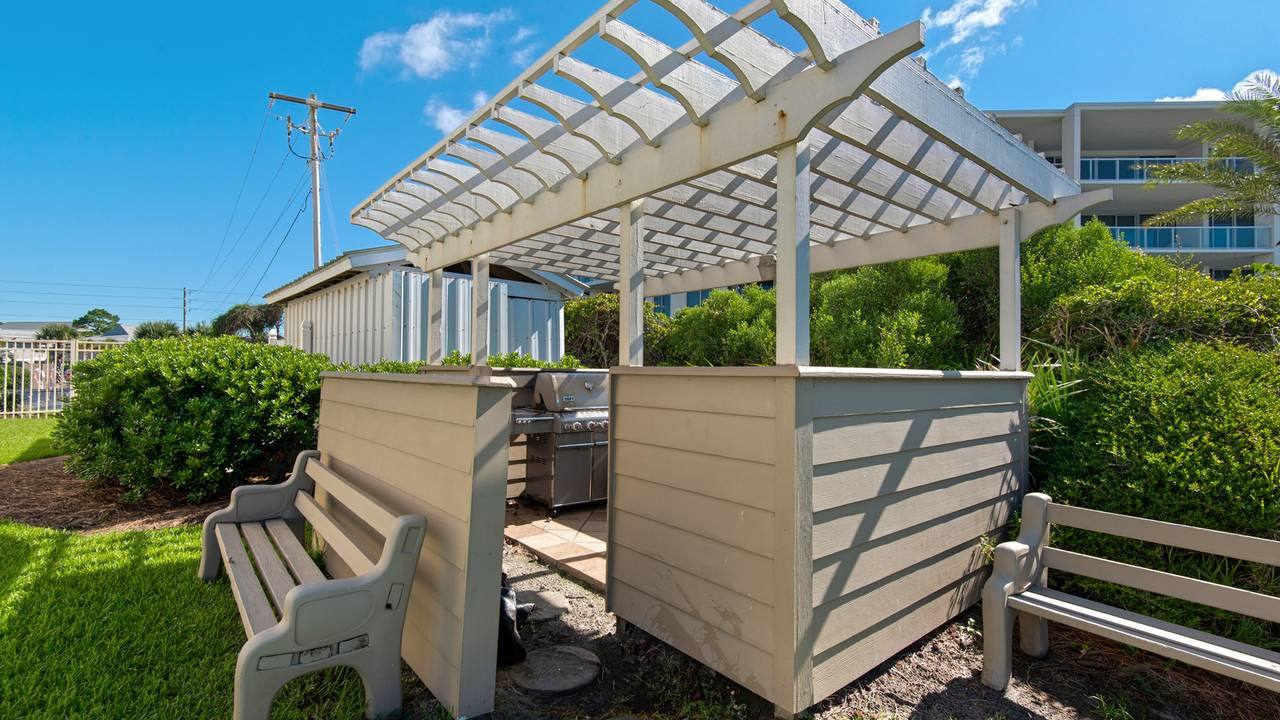 Picnic area with grills and grass area Picnic area with grills and grass area