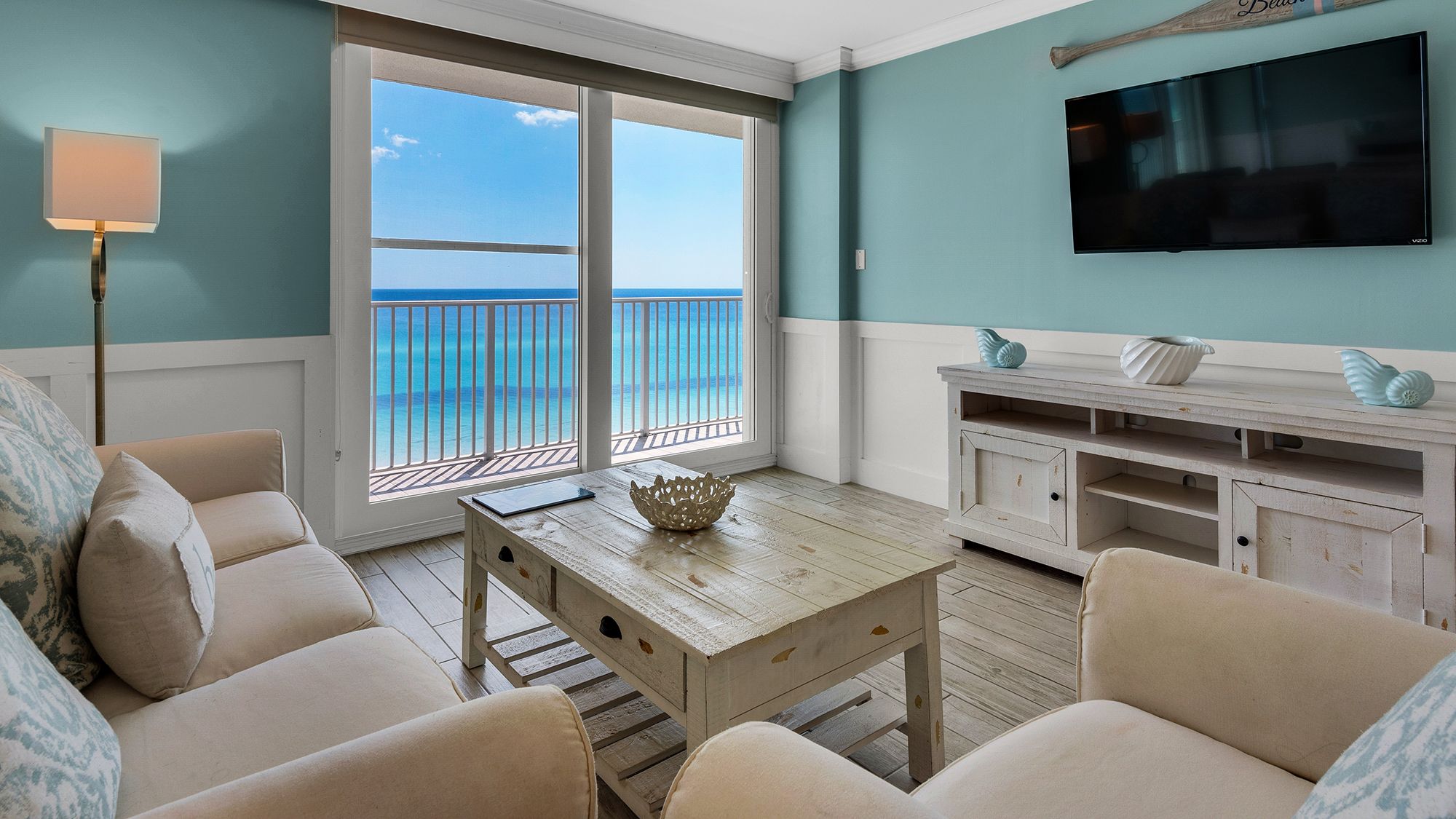 BeachCrest 604 Gulf Front Living room with private balcony and l