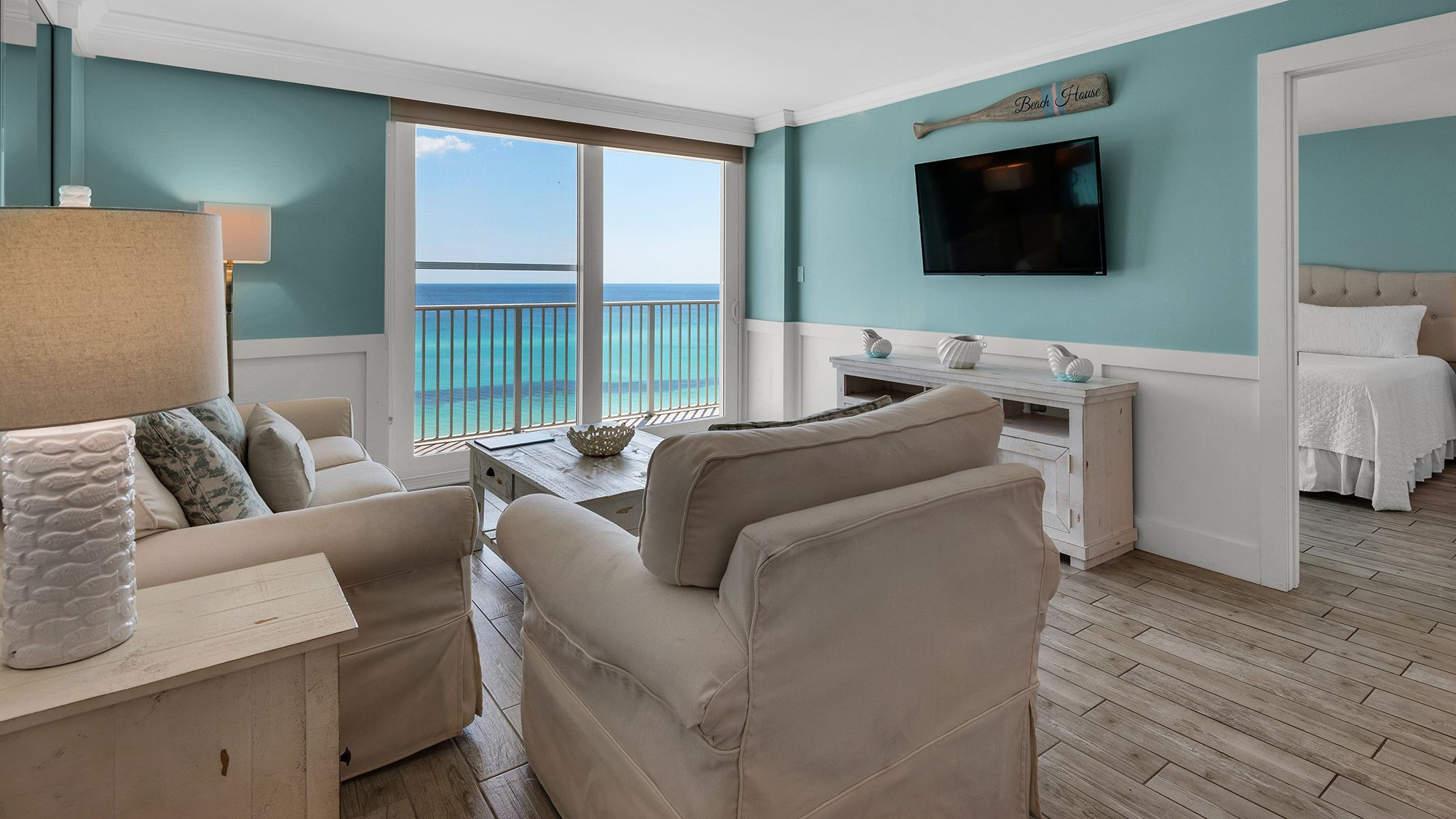 BeachCrest 604 Gulf Front Living room with private balcony and l