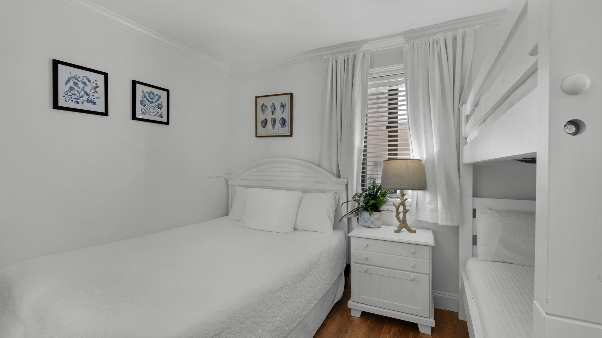 Beachside Condo 1 Guest Bedroom with Queen and Twin Bunks