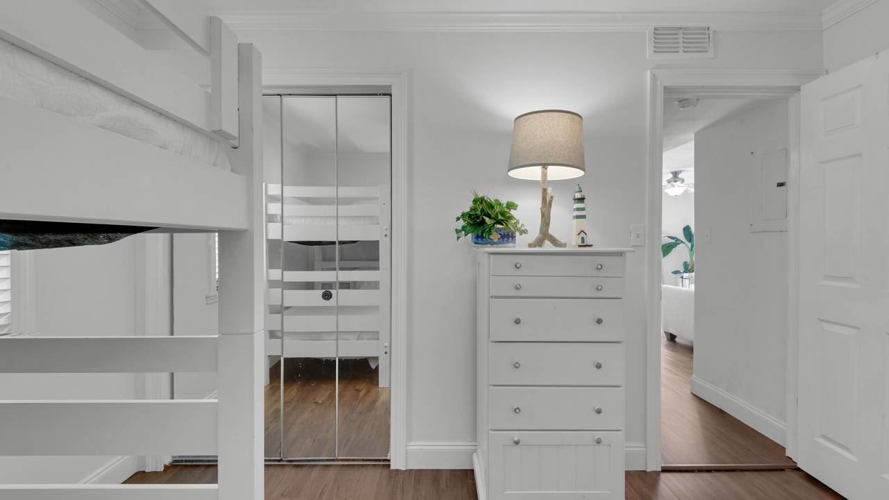 Beachside Condo 1 Guest Bedroom with Queen and Twin Bunks Beachside Condo 1 Guest Bedroom with Queen and Twin Bunks