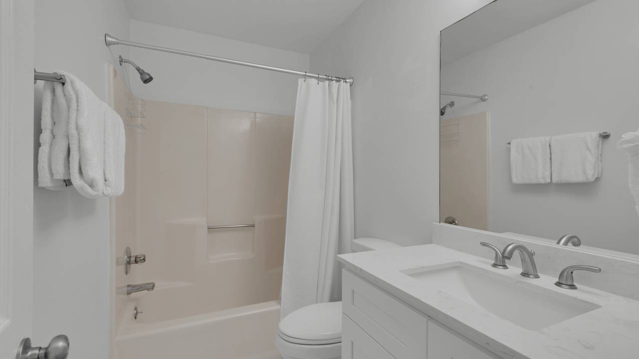 Beachside Condo 1 Guest Bathroom Beachside Condo 1 Guest Bathroom