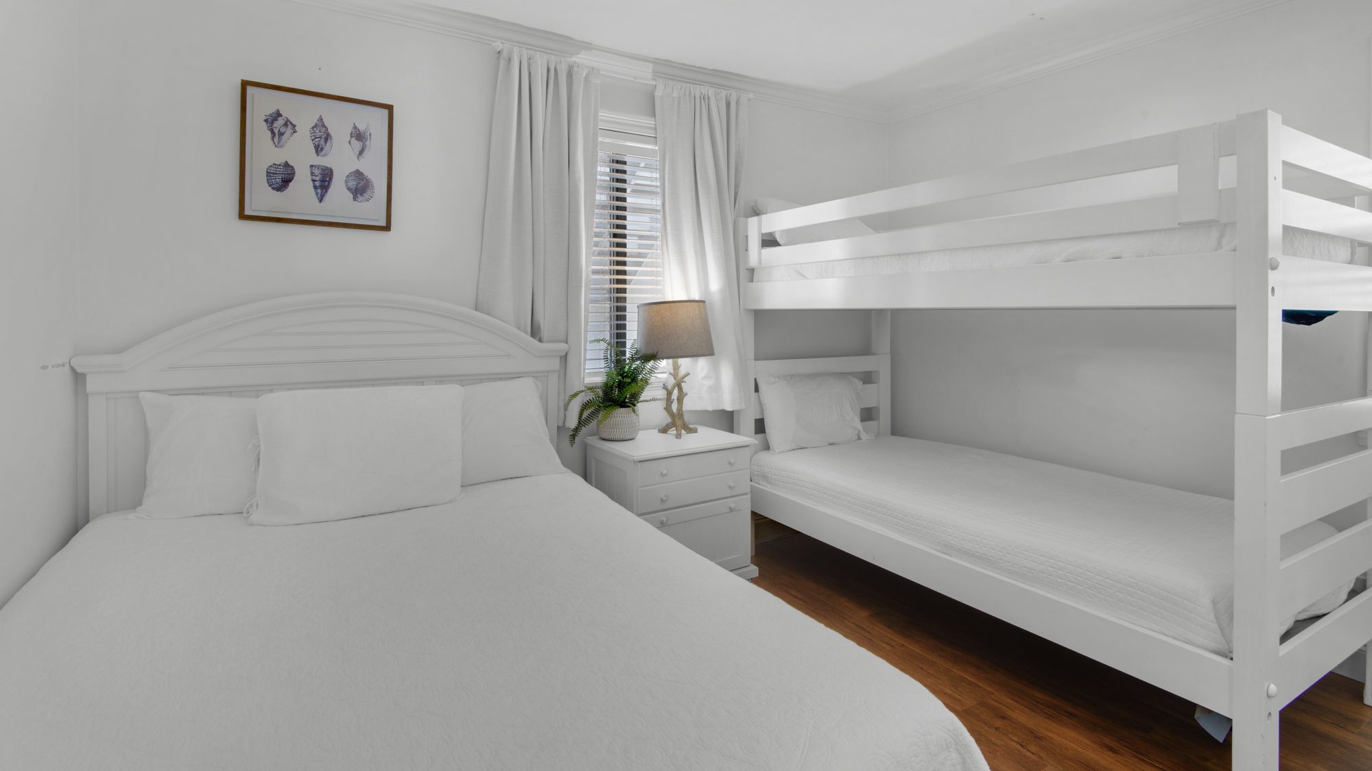 Beachside Condo 1 Guest Bedroom with Queen and Twin Bunks