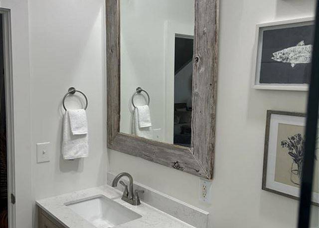 CRN Full bath conveniently located off the foyer.