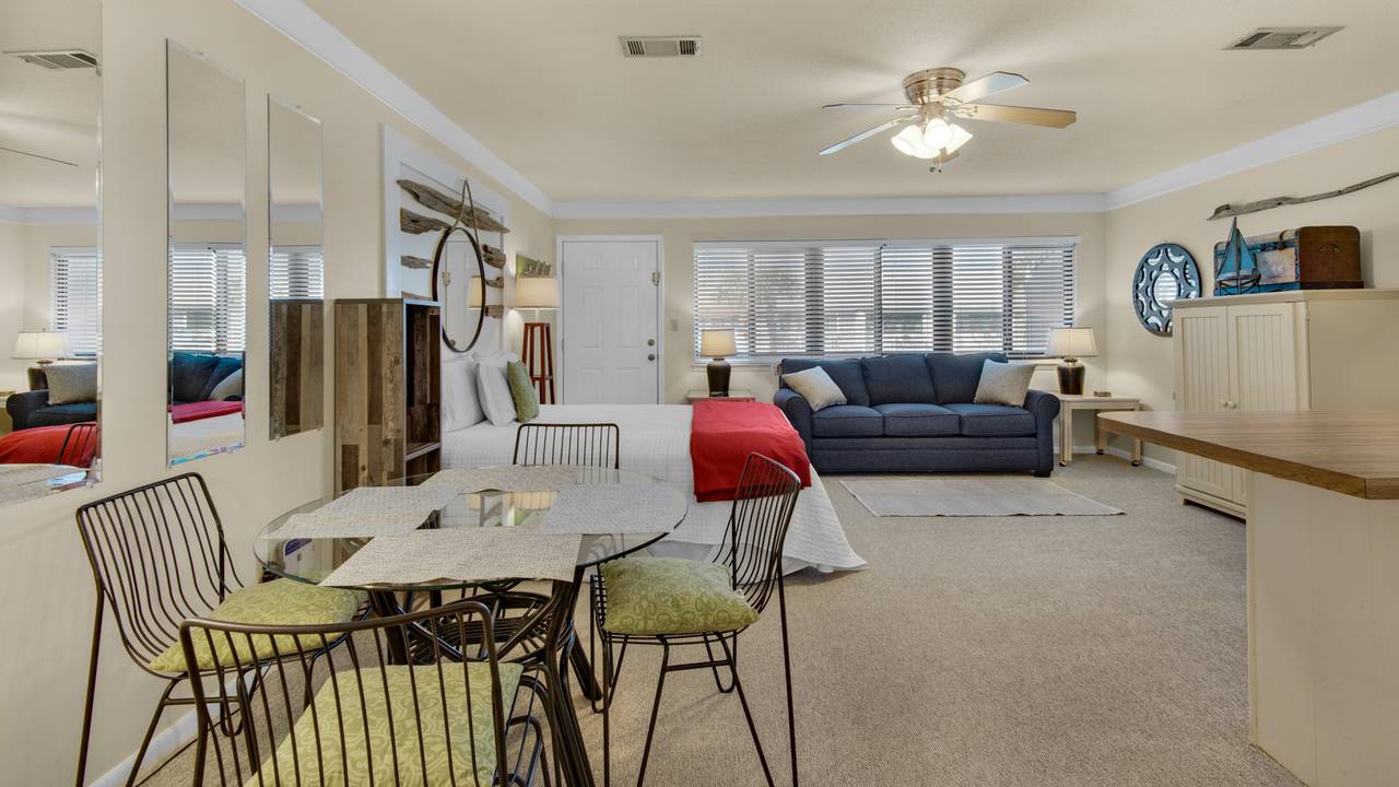 Hidden Beach Villas 240 Dining Table and Living Area Hidden Beach Villas 240 Dining Table and Living Area