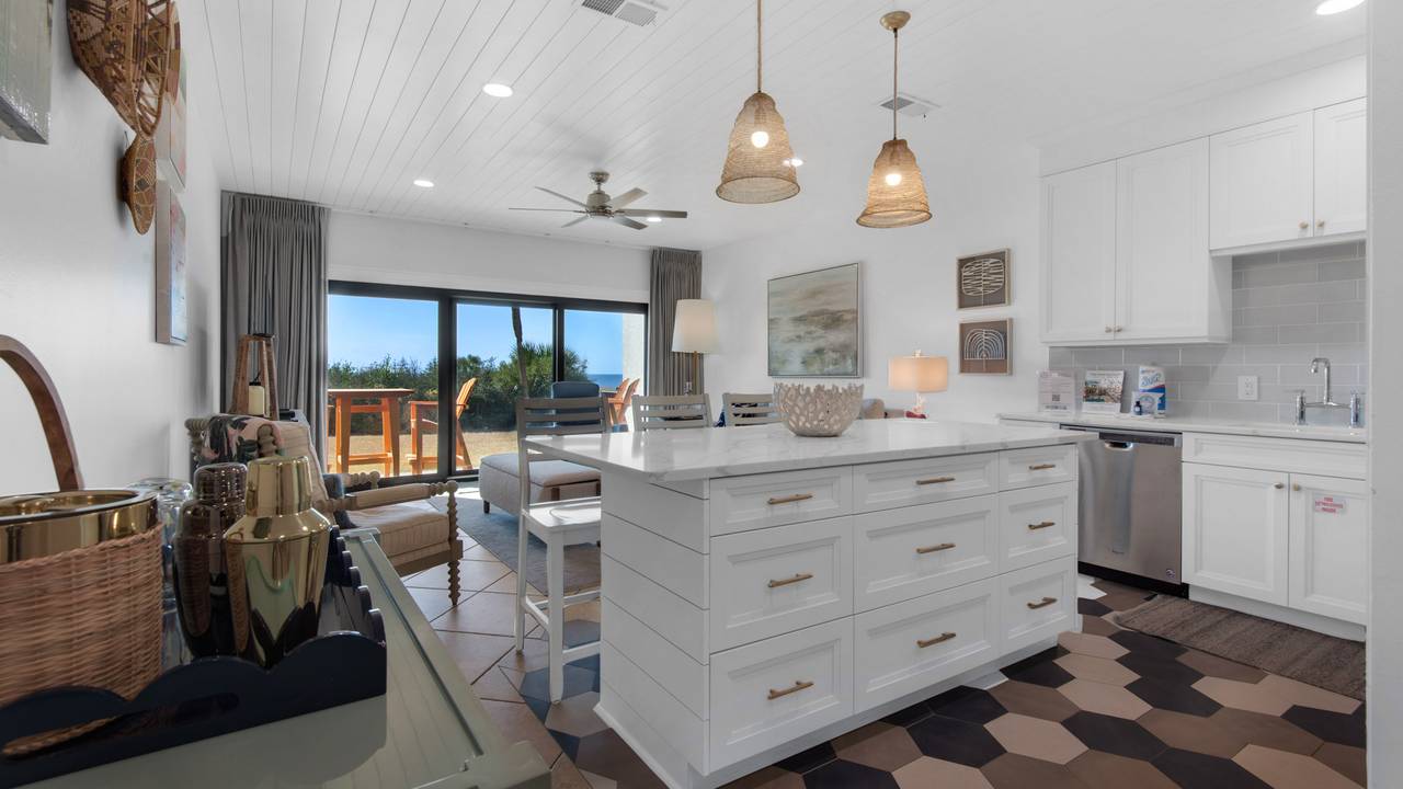 Palms C4 Kitchen into living area and patio Palms C4 Kitchen into living area and patio