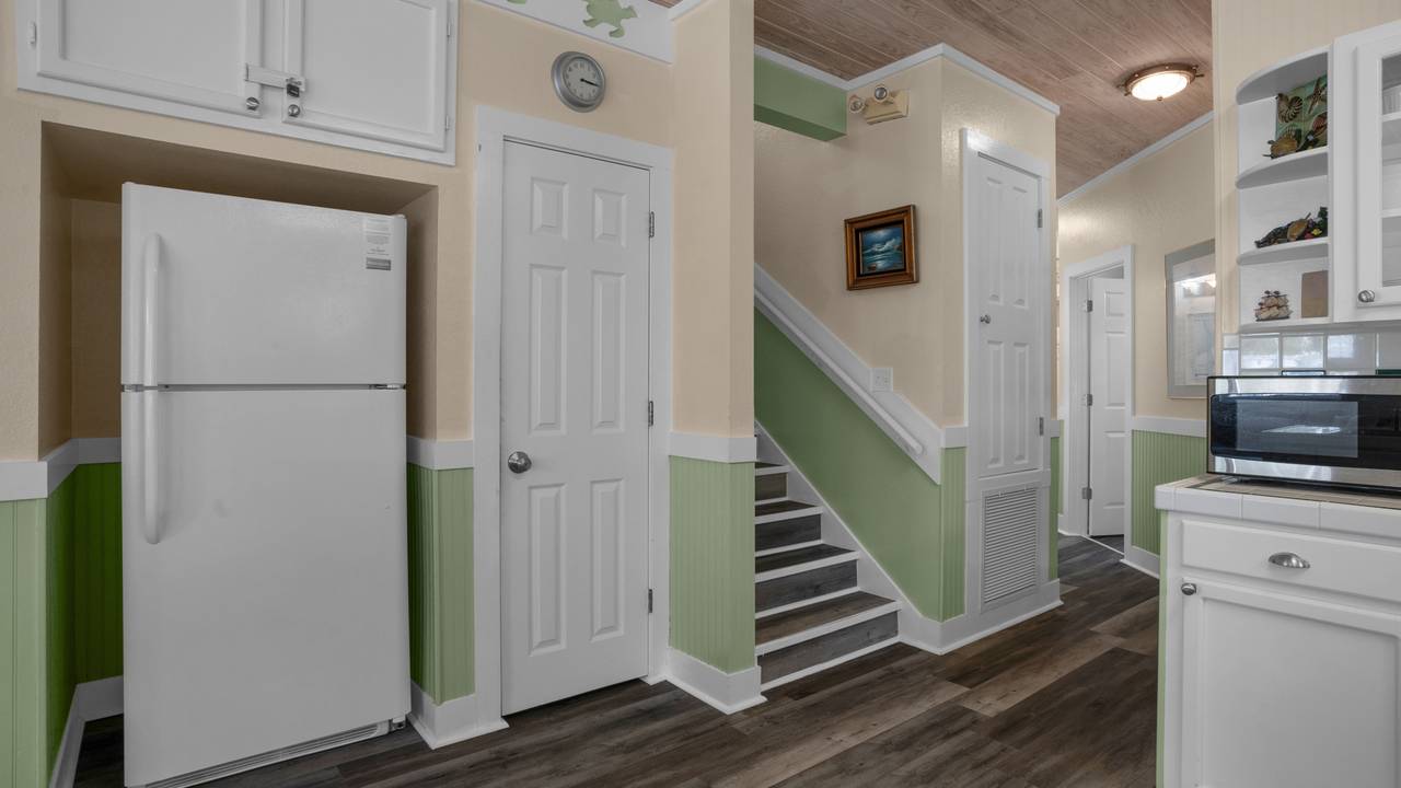 Sea Turtle Pass Kitchen and Stairs Sea Turtle Pass Kitchen and Stairs