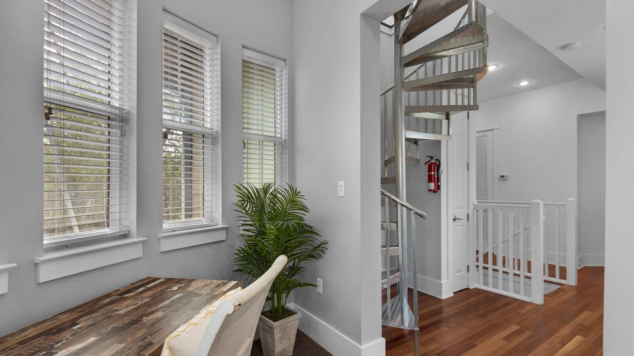 139 N Ryan St - Spiral stairs going to loft 139 N Ryan St - Spiral stairs going to loft