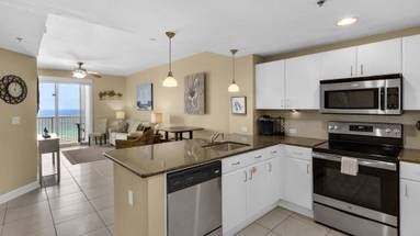 Grand Panama 1-1006 Kitchen into living area w/ Gulf views Grand Panama 1-1006 Kitchen into living area w/ Gulf views