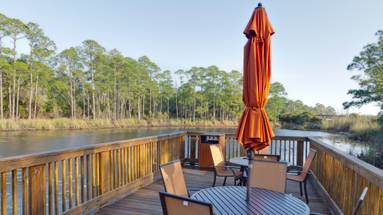 Redfish Village - Deck for fishing and dining Redfish Village - Deck for fishing and dining