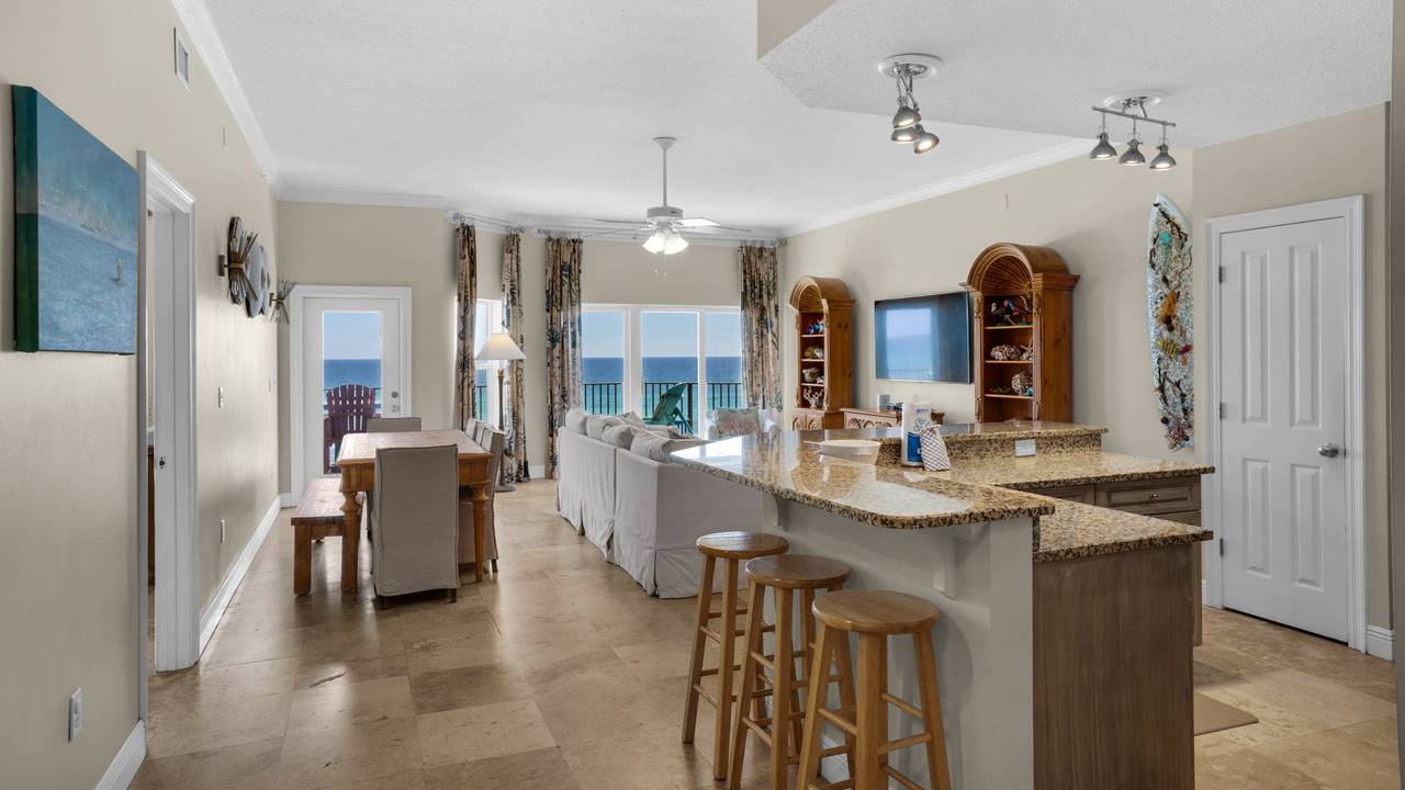 Legacy 303 Kitchen into Dining & Living area w/ Gulf views Legacy 303 Kitchen into Dining & Living area w/ Gulf views