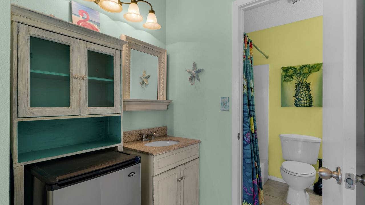 Portside Resort D1 Master Bedroom Mini Fridge, Vanity Sink and S Portside Resort D1 Master Bedroom Mini Fridge, Vanity Sink and S