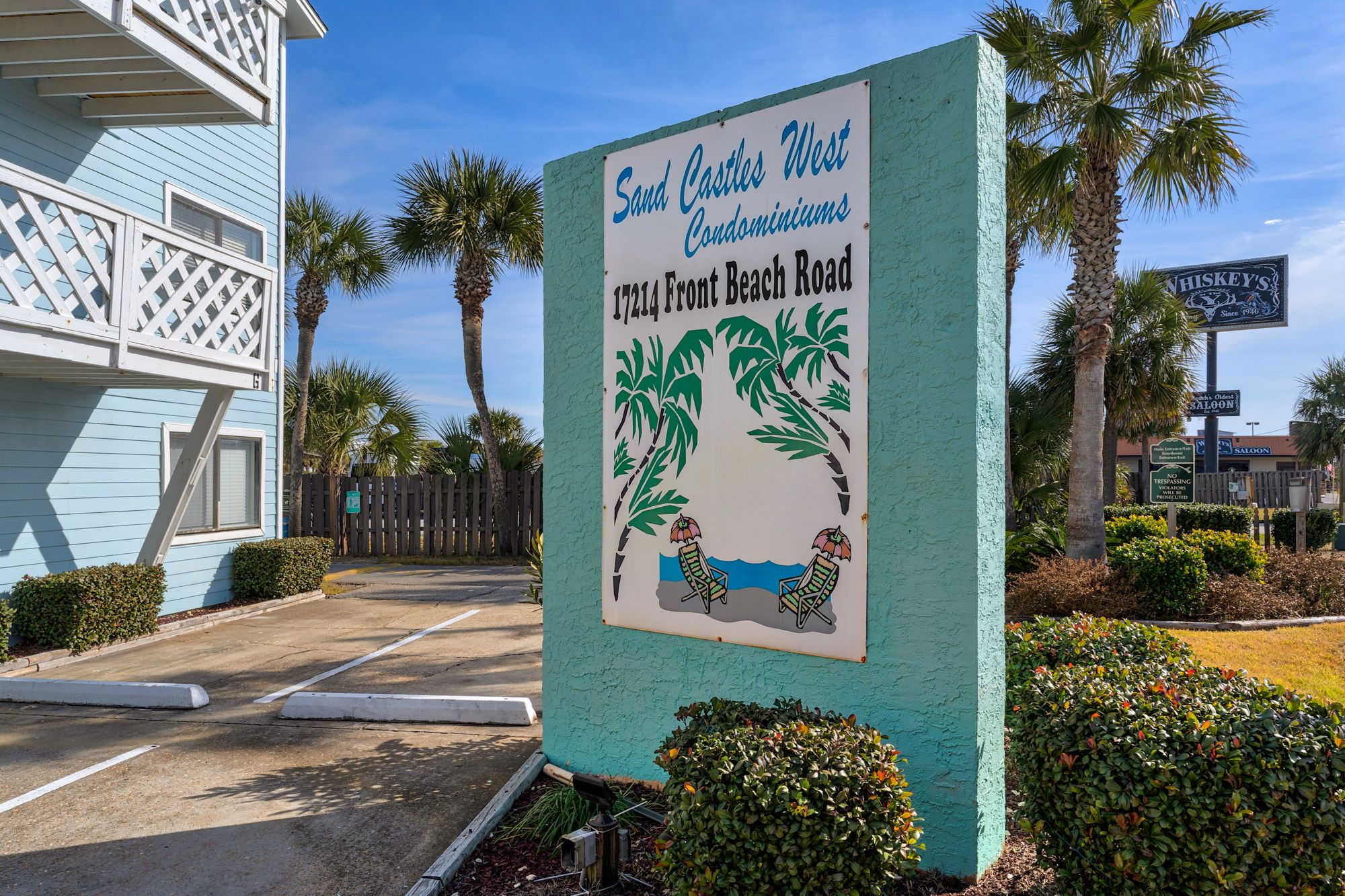 Sand Castle West Sign