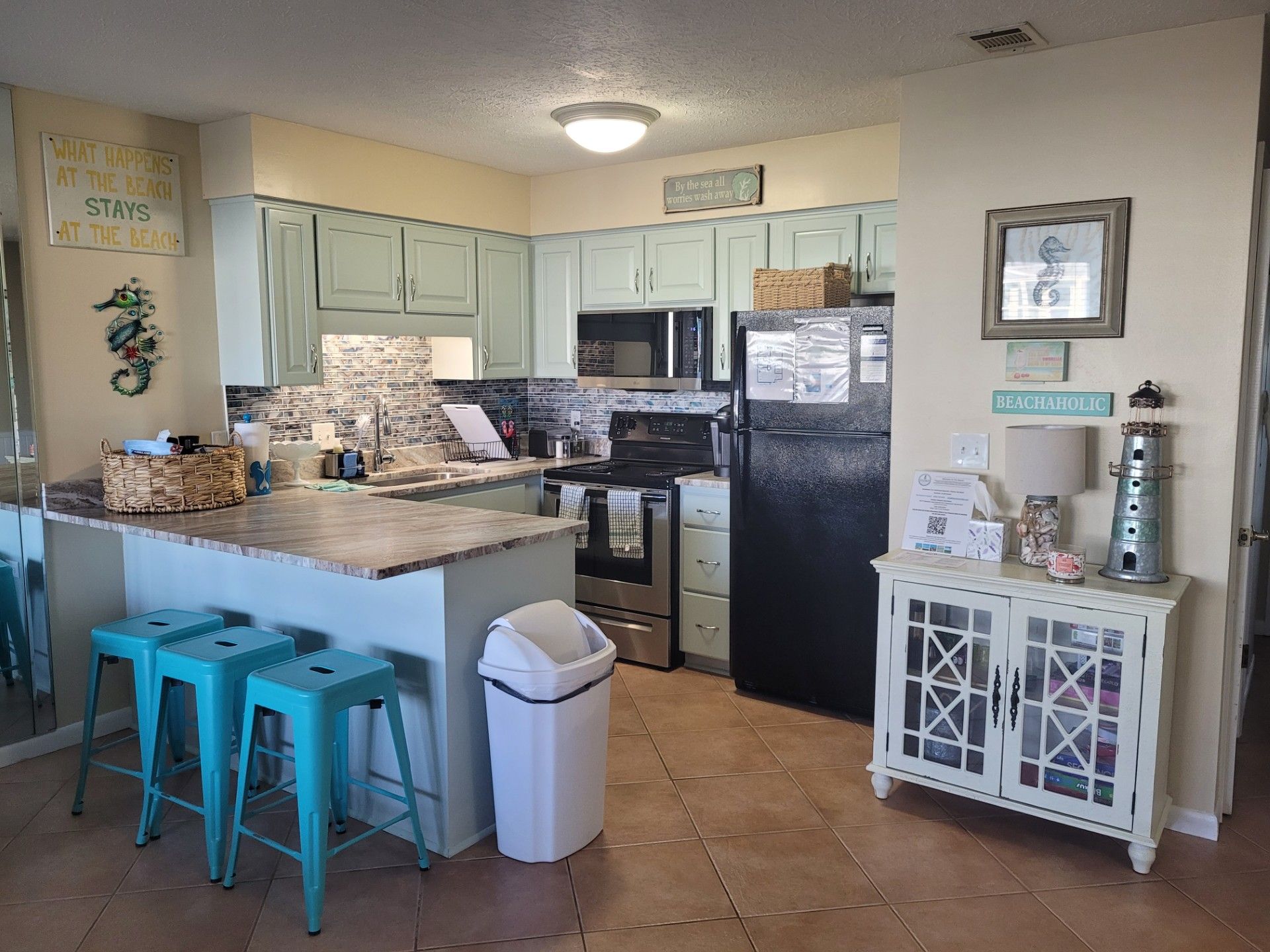 Newly repainted kitchen with new LG microwave