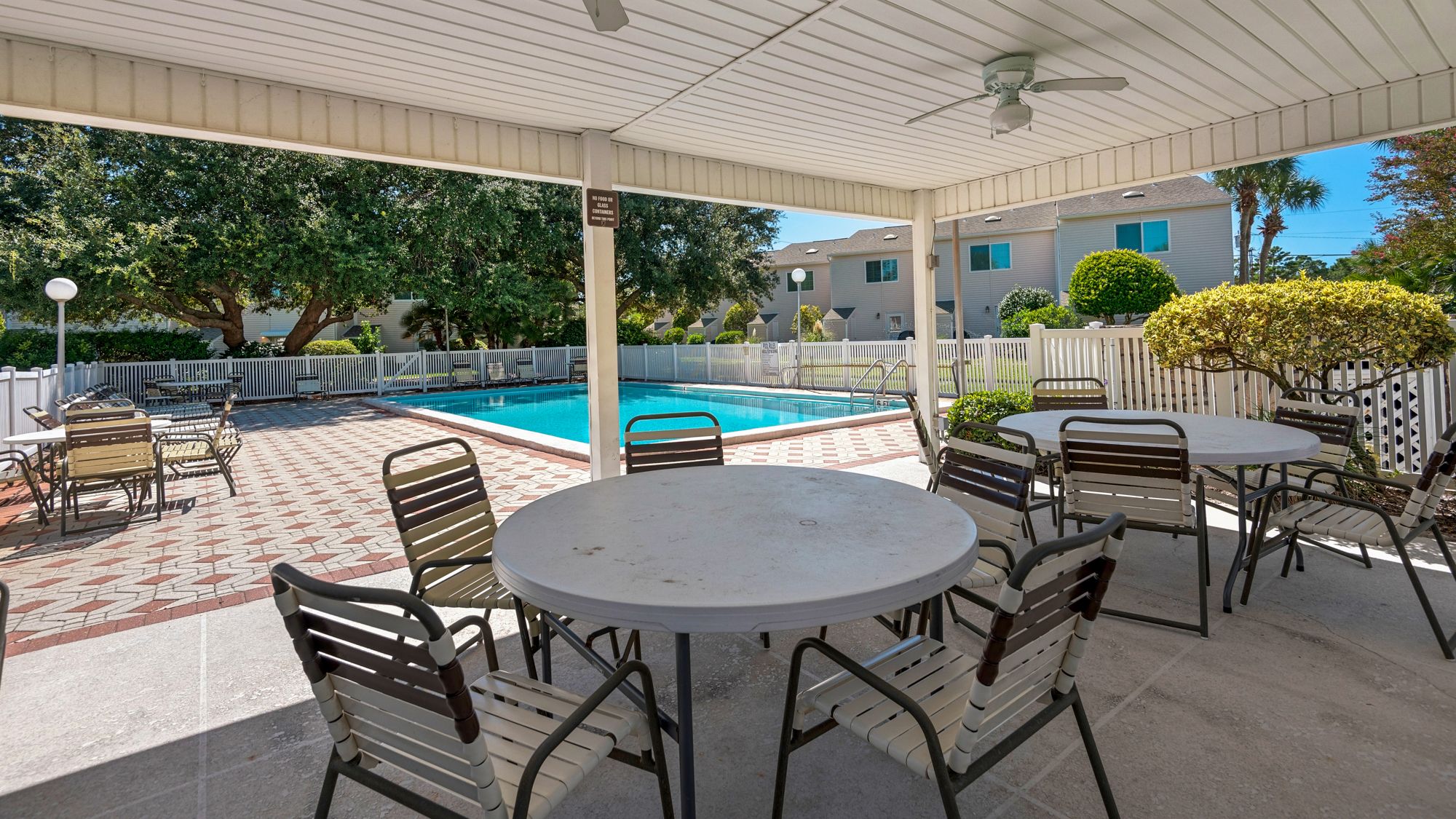Woodland Shores Pool 1 with tables and chairs