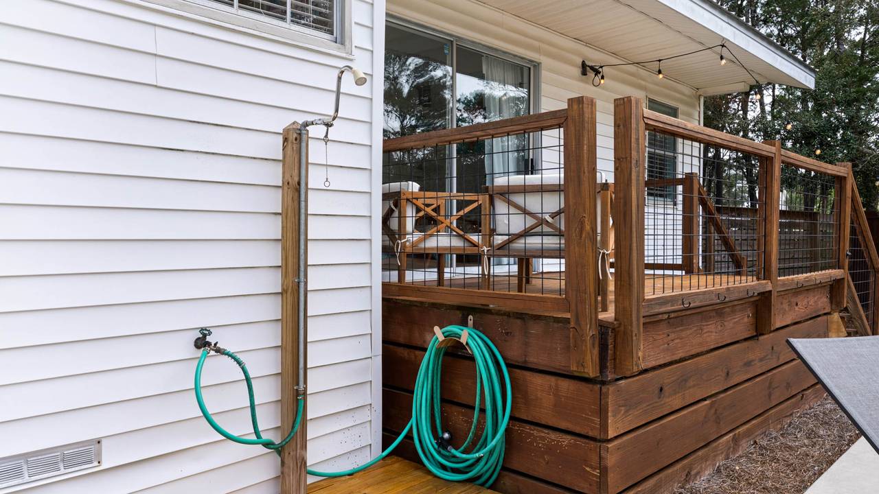 Coastal Charm: Backyard Rinse off area Coastal Charm: Backyard Rinse off area