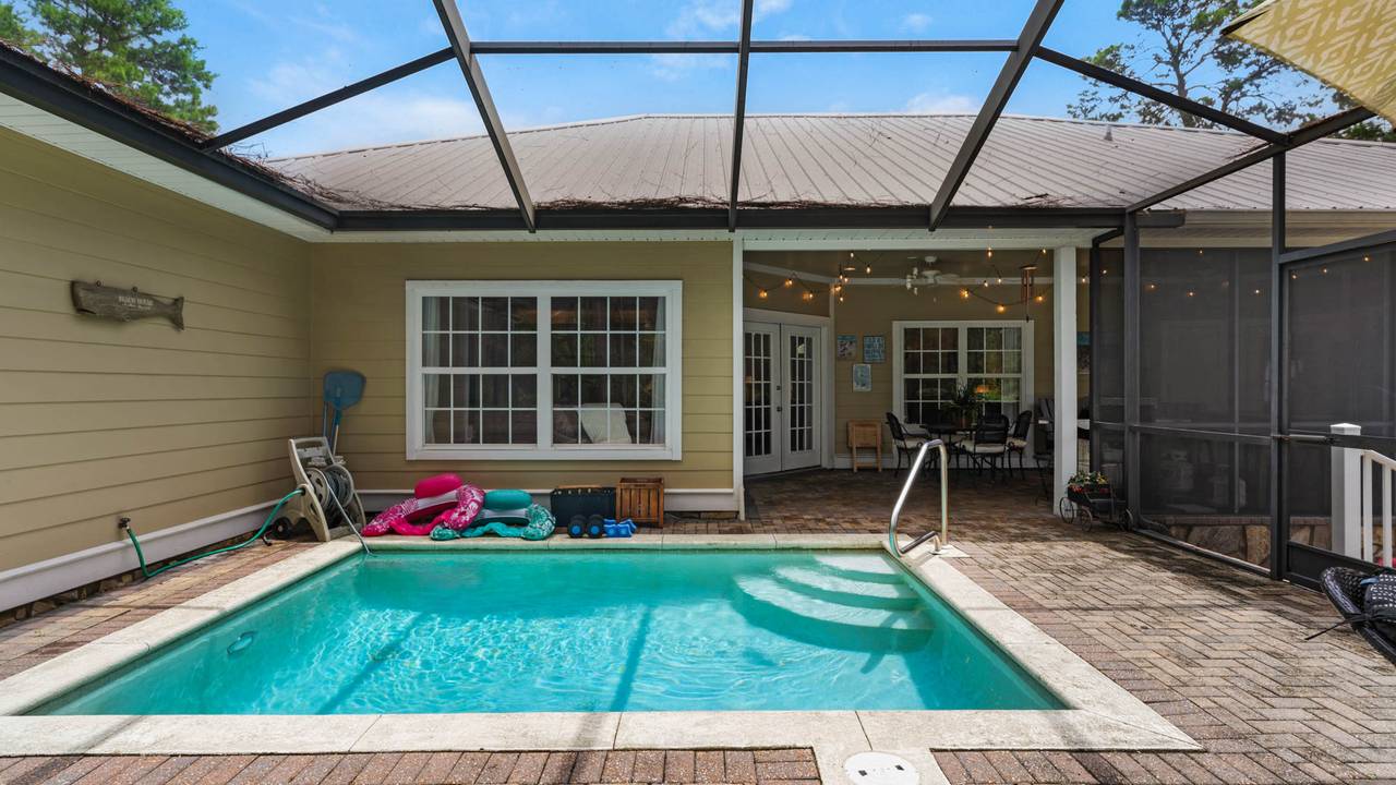 Screened-in Private Heated Pool Screened-in Private Heated Pool