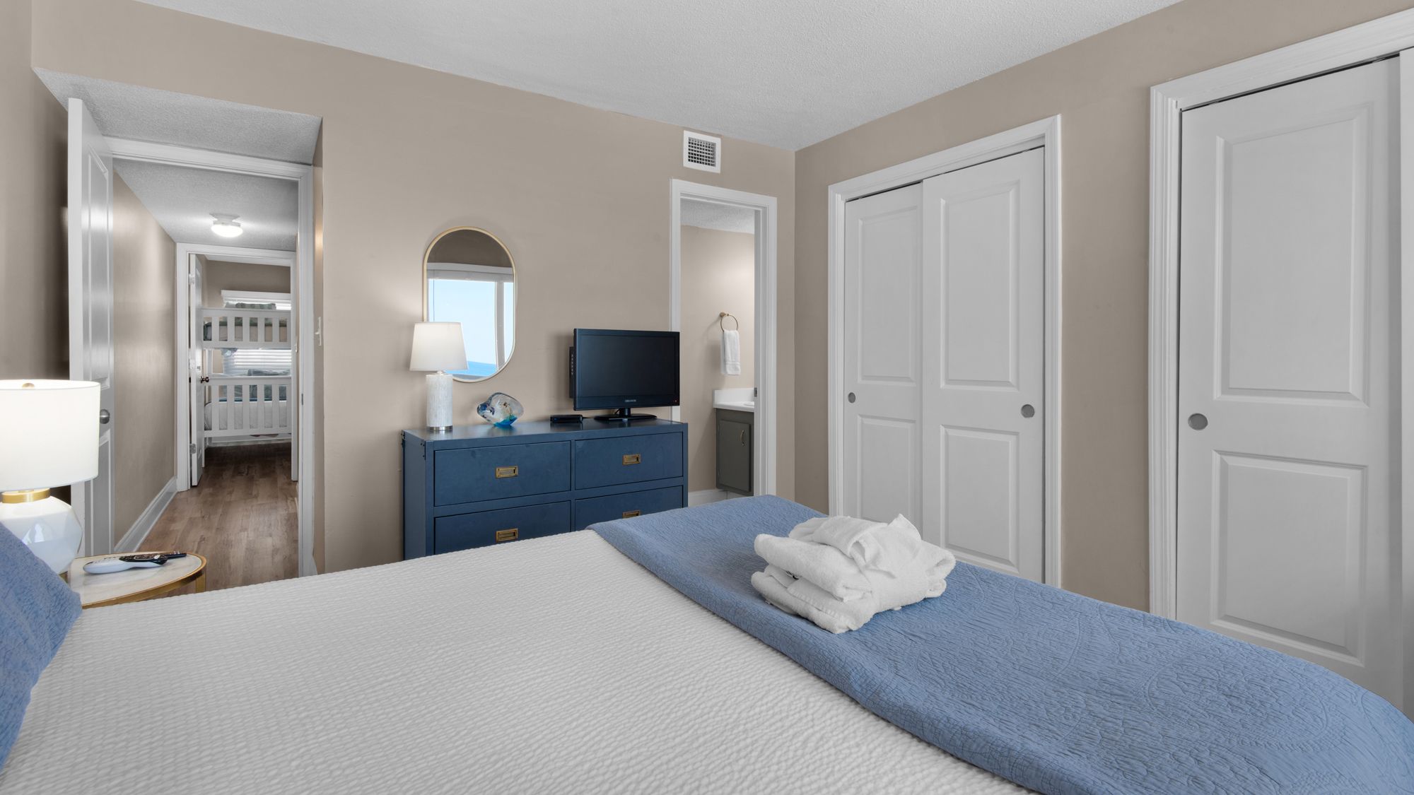 Pinnacle Port A113 - Primary bedroom w/ king bed & balcony acces