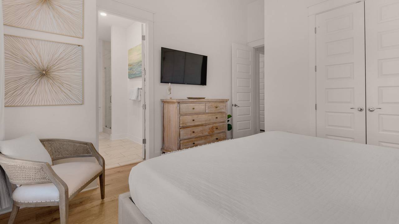 Prominence B - 30 Ray | Master bedroom w/ King bed & TV Prominence B - 30 Ray | Master bedroom w/ King bed & TV