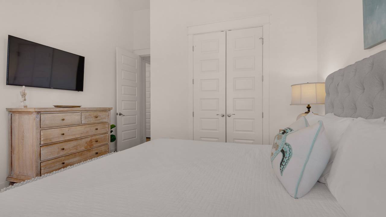 Prominence B - 30 Ray | Master bedroom w/ King bed & TV Prominence B - 30 Ray | Master bedroom w/ King bed & TV