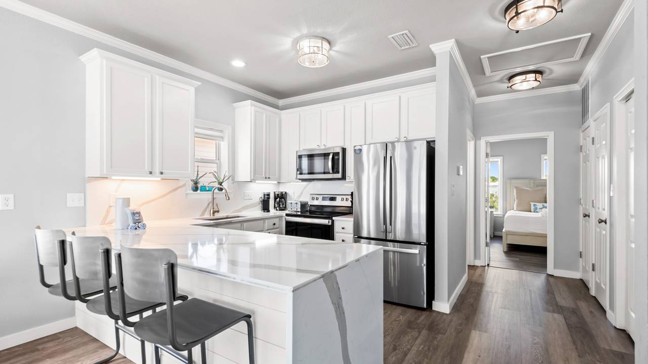 Salty Seabreeze 2nd Floor - Kitchen into Guest Bedroom Salty Seabreeze 2nd Floor - Kitchen into Guest Bedroom