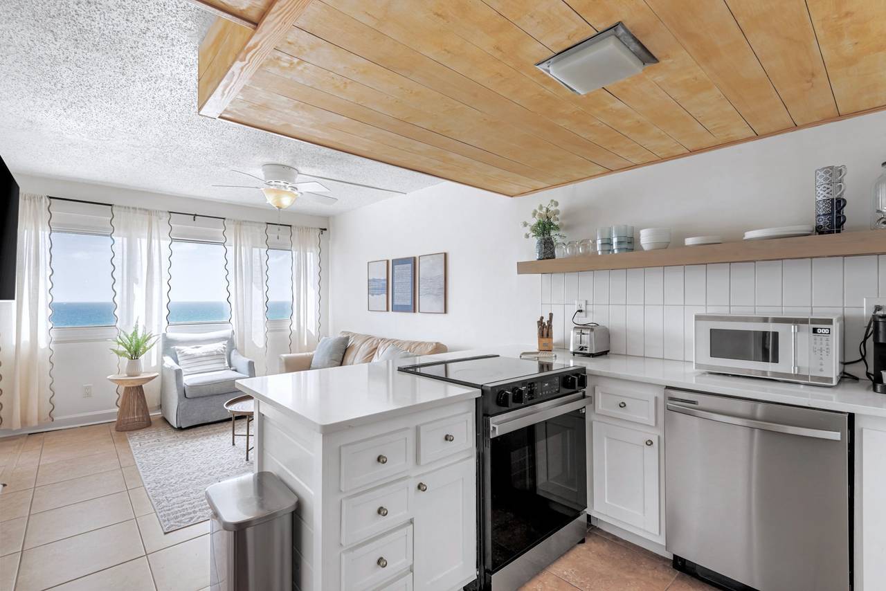 2nd Level - Kitchen into living area w/ Gulf views 2nd Level - Kitchen into living area w/ Gulf views