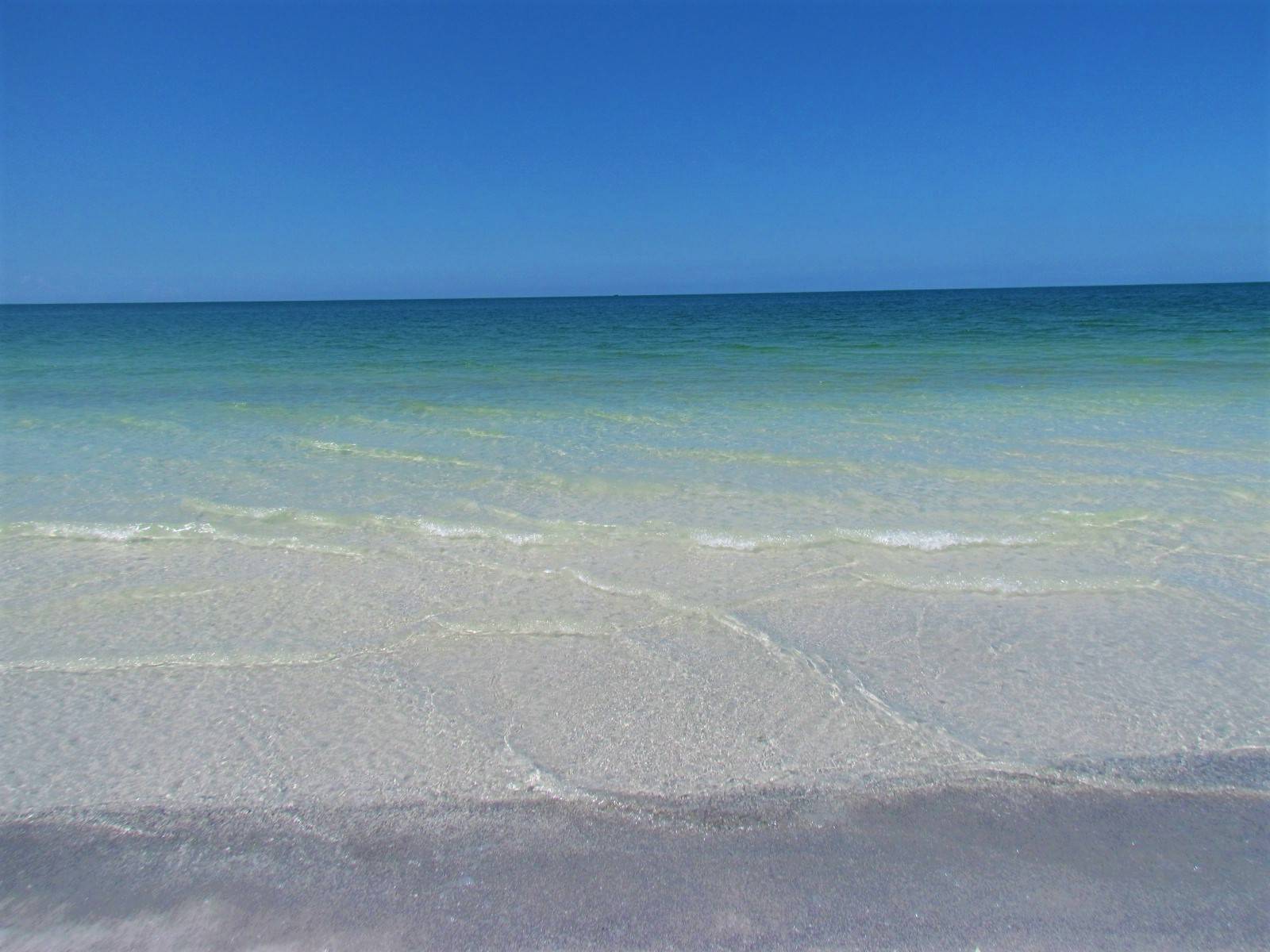 Crystal Clear Water Of Indian Rocks Beach. Right Behind This Complex!