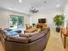 Living room with ample seating and flat screen T.V.