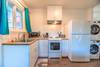 The kitchenette has a nice fridge and washer/dryer