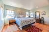The primary is on the main level with a comfy King bed