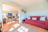This comfy couch opens to reveal a double bed