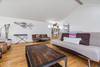 It includes 2 fold-out futon couches.