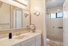 The ensuite bathroom is well appointed w a large shower.