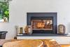 The wood burning fireplace adds warmth and charm