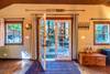 French doors leading you to your redwood paradise