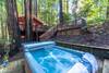 Enjoy the hot tub under the trees