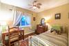 Bedroom 3 includes a twin bed and desk