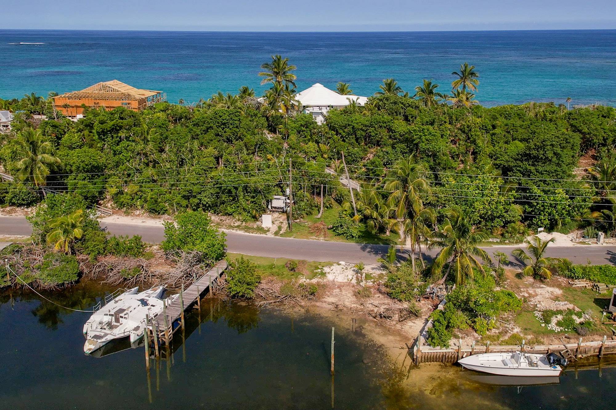Our own private dock with our trimaran boat tied to one side of the dock. The other side is for renters.