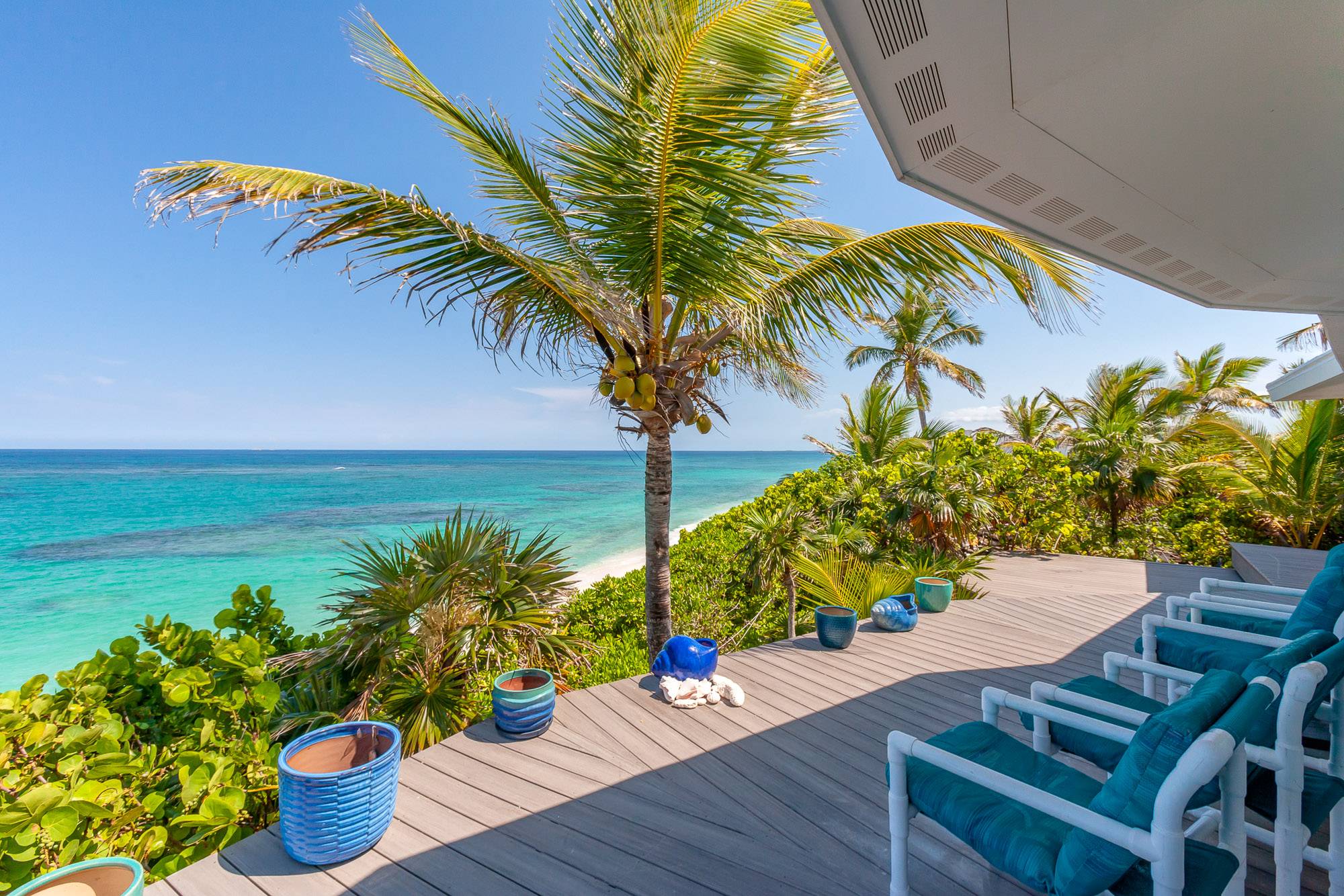 The coral reef out front and colorful fish are a short swim from