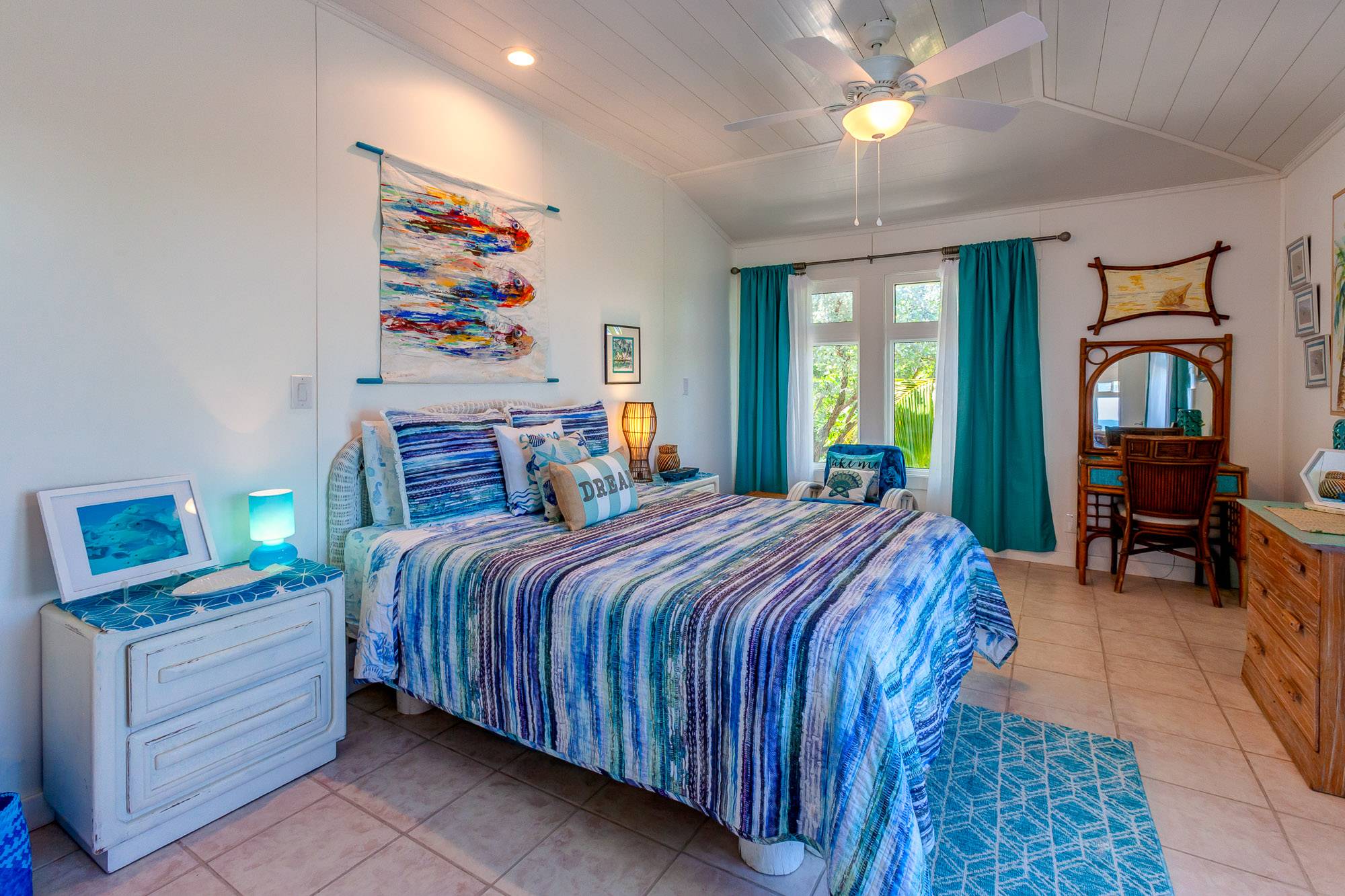 First guest bedroom with queen sized bed.