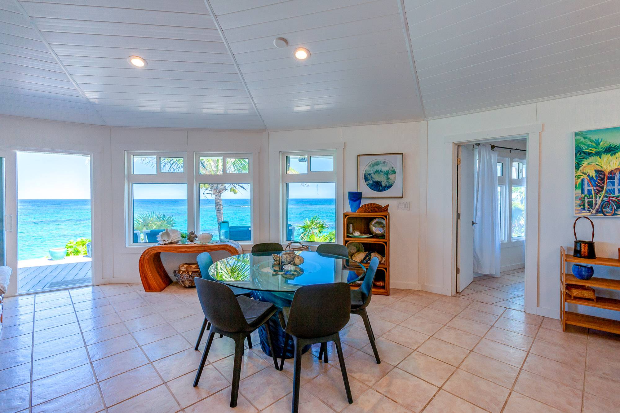 Dining with a view. Easily maintained sand colored tile floors throughout the house.