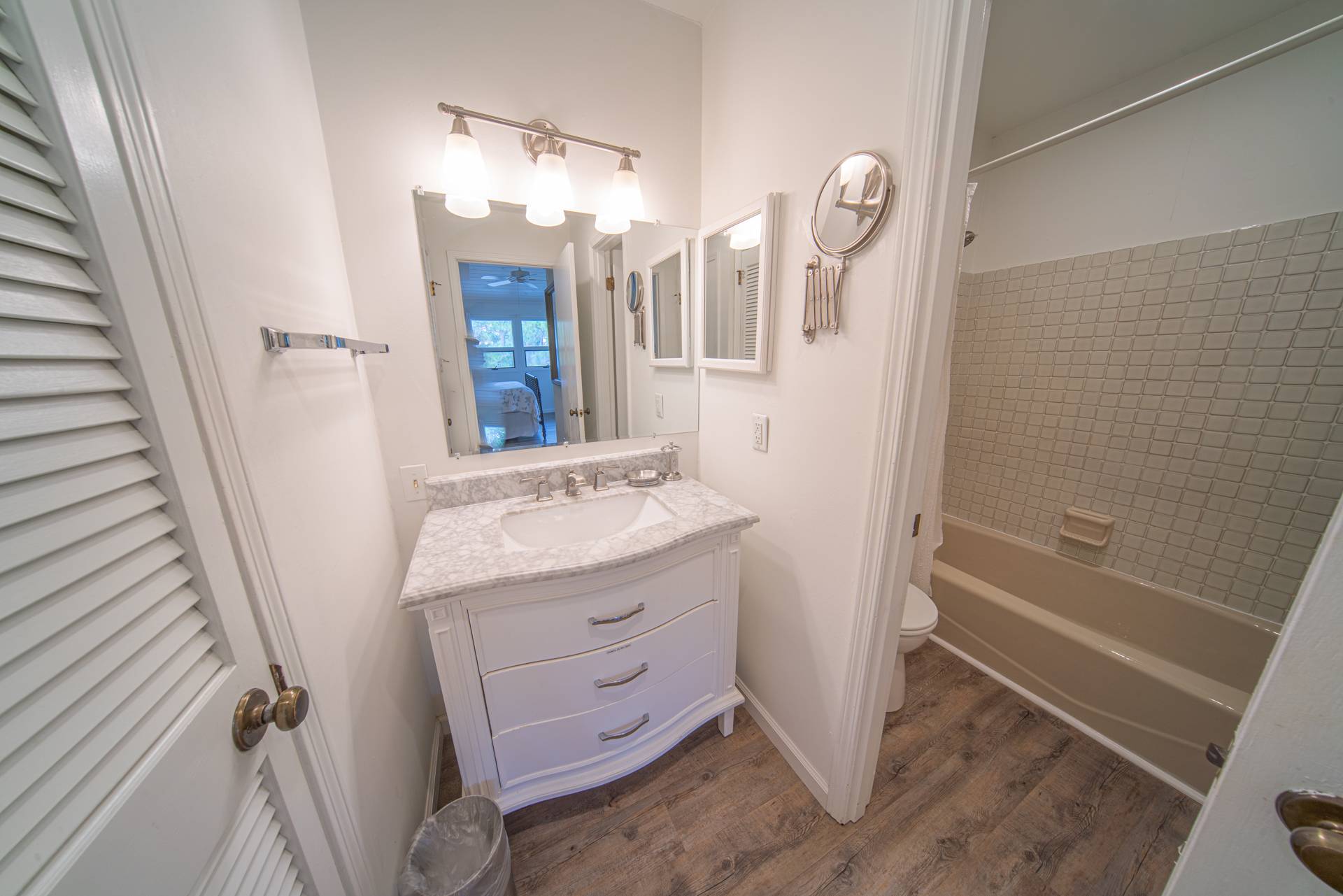 Master King Bedroom private bath with separate vanity and combination tub/shower