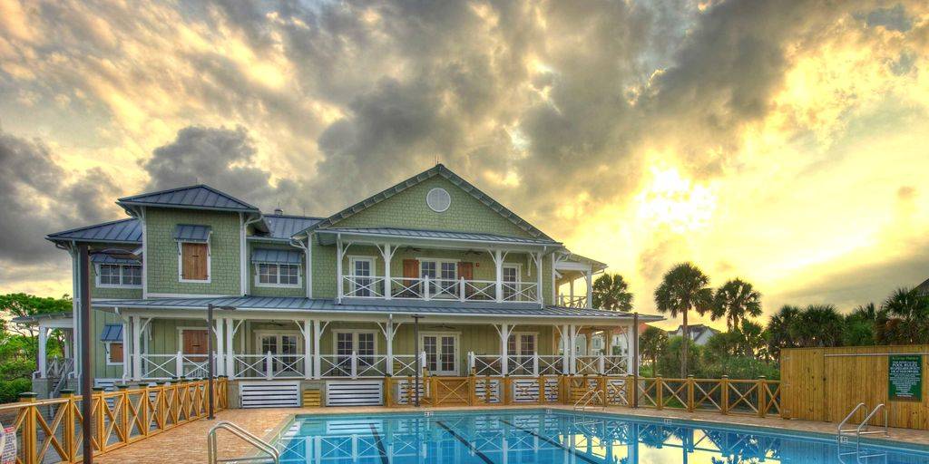 The Plantation Clubhouse w/ community swimming pool, tennis court and fitness!