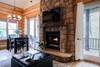 Living room with fireplace and flat screen TV