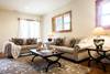 Downstairs living area with queen sleeper sofa.